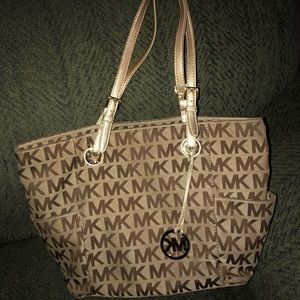 Michael Kors gold and tan purse